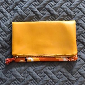 Orange vegan leather clutch
